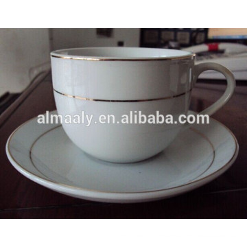 Chinese white ceramic coffee cup and saucer with decal